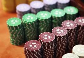 Live dealer studio setup with multi-currency table displays on osg88